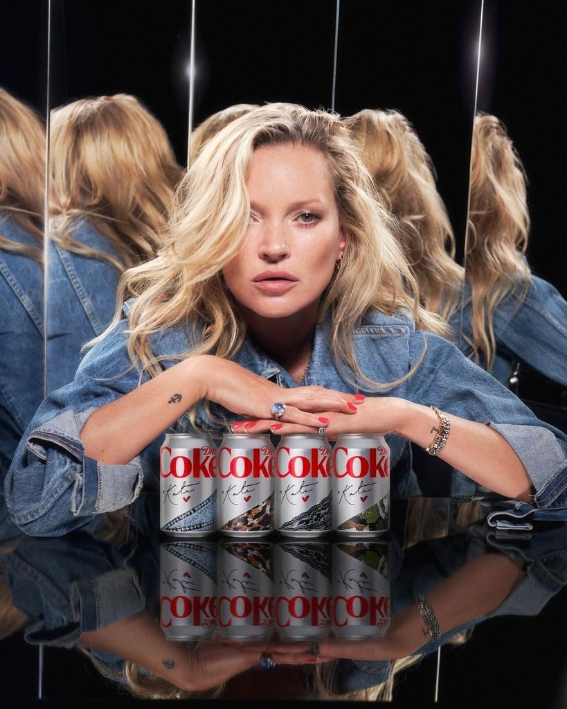 Kate Moss with cans of Diet Coke