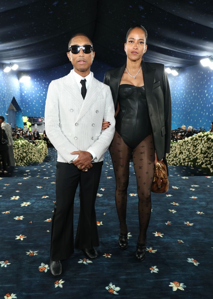 Pharrell Williams and Helen Lasichanh attend the 2025 Met Gala Celebrating "Superfine: Tailoring Black Style" at Metropolitan Museum of Art on May 05, 2025 in New York City