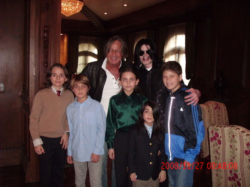 Singer Michael Jackson (3rd R) poses with real estate developer Mohamed Hadid (3rd L), Hadid's children and Jackson's children Michael Joseph Jr. (L), Paris Michael Katherine (C) and Prince Michael II (2nd R) on November 27, 2008 at the Jackson Holmby Hills residence in Westwood, California.  Michael Jackson spent his final days in the house that Hadid had originally built and that Jackson leased for $100,000 a month from the current owner. Hadid, who calls himself a close friend of Michael Jackson, spent some of Jackson's last days with him and is now speaking out about Jackson's health and state of mind during the last few weeks before his death