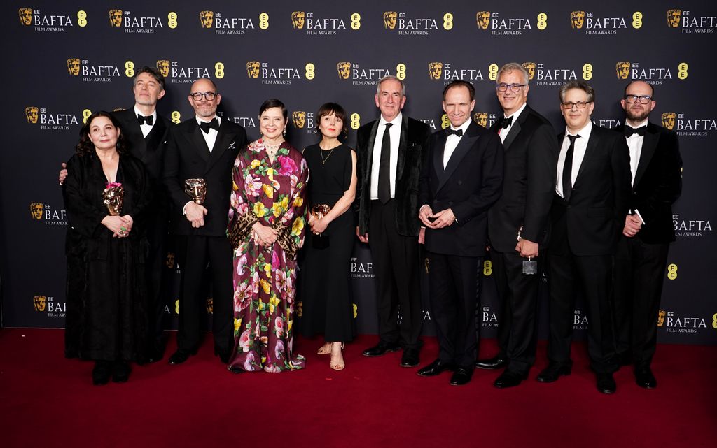 Best Film winners Conclave including Ralph Fiennes, Isabella Rossellini and director Edward Berger in the press room during the 78th British Academy Film Awards, at the Royal Festival Hall
