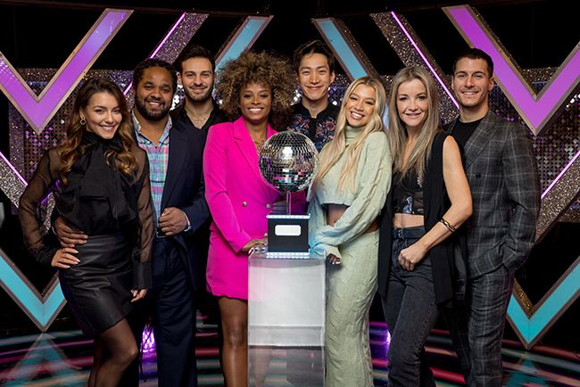 Strictly finalists celebs and pros stand with glitterball trophy