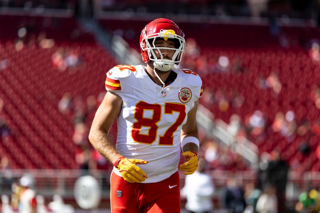 Travis Kelce #87 of the Kansas City runs as he warms up during an NFL Football game against the San Francisco 49ers at Levi's Stadium on October 20, 2024 in Santa Clara, California.