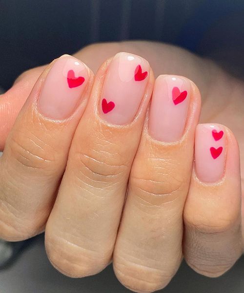 sporadic red heart nails by jess maynard