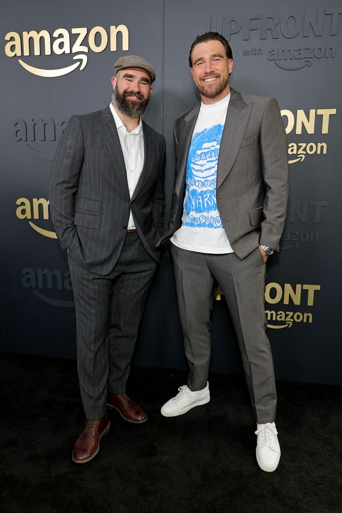 Jason Kelce and Travis Kelce wear suits at Amazon 2025 in advance