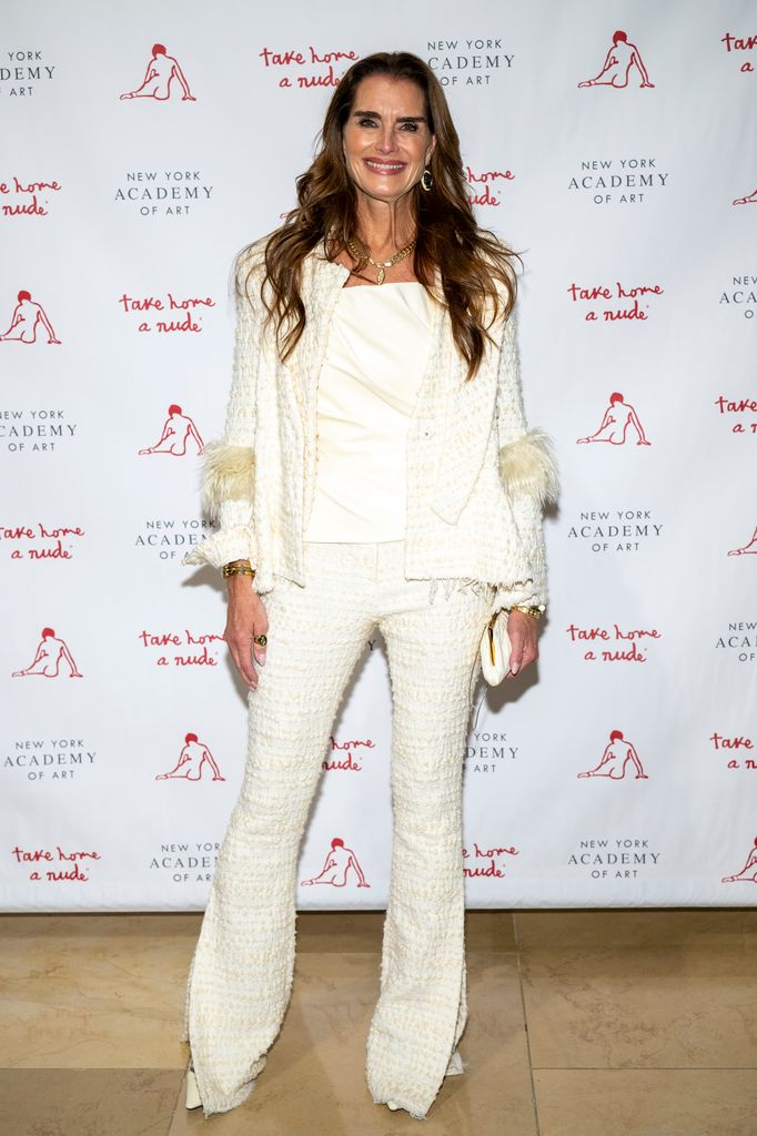 Brooke Shields in white flares, top and blazer