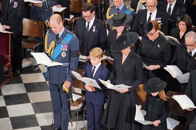 Kate, William, George and Charlotte at the Queens funeral