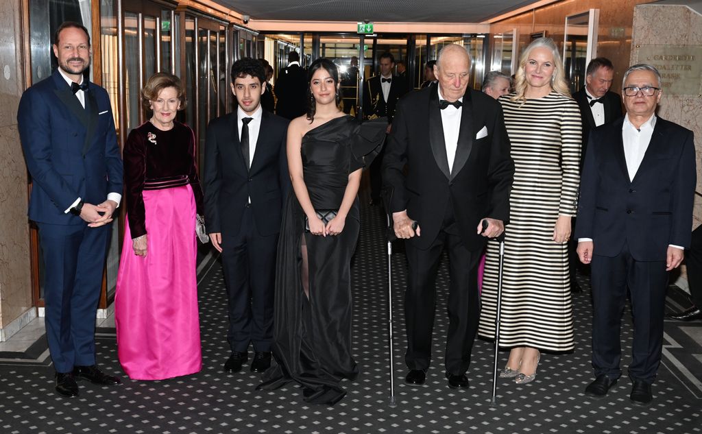 Crown Prince Haakon, Queen Sonja, Ali Rahmani,  Kiana Rahmani, King Harald, Crown Princess Mette- Marit and Taghi Rahmani attend the Nobel Peace Prize banquet
