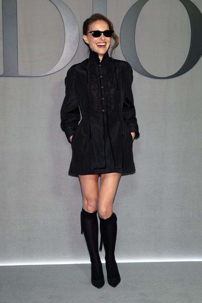 Natalie paired long socks with pointed-toe heels
