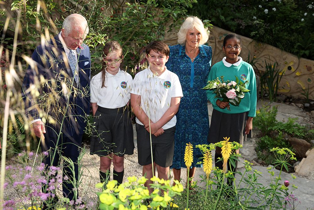 Charles and Camilla meet children in the No Parents Allowed garden