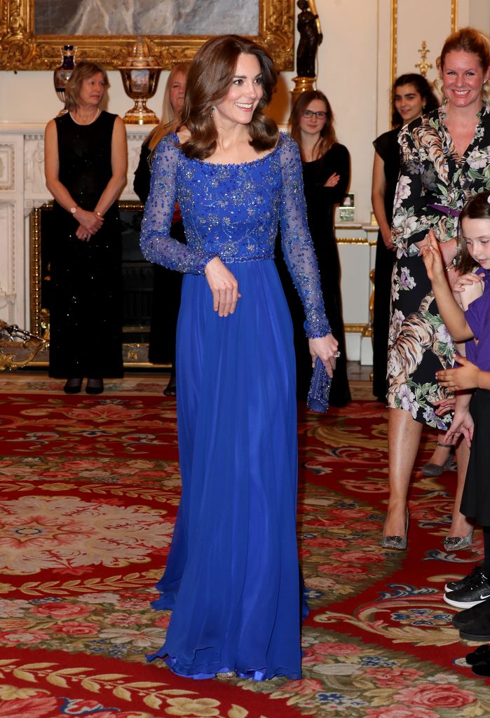 Kate at Buckingham Palace in royal blue gown