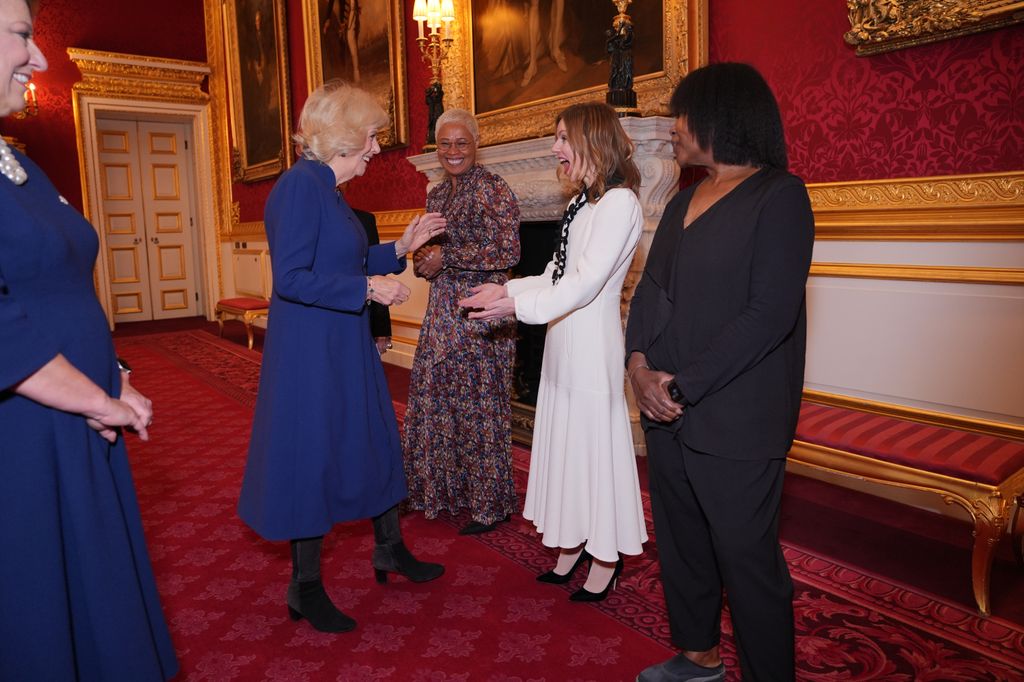 Queen Camilla greets Royal Commonwealth Society Ambassador Geri Halliwell-Horner, during a reception to celebrate the winners of the Queen's Commonwealth Essay Competition at St James's Palace on November 20, 2025 in London