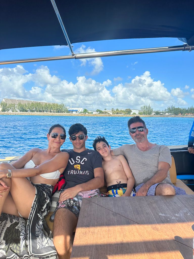 Lauren Silverman and Simon Cowell pose with son Eric and Lauren's son Adam