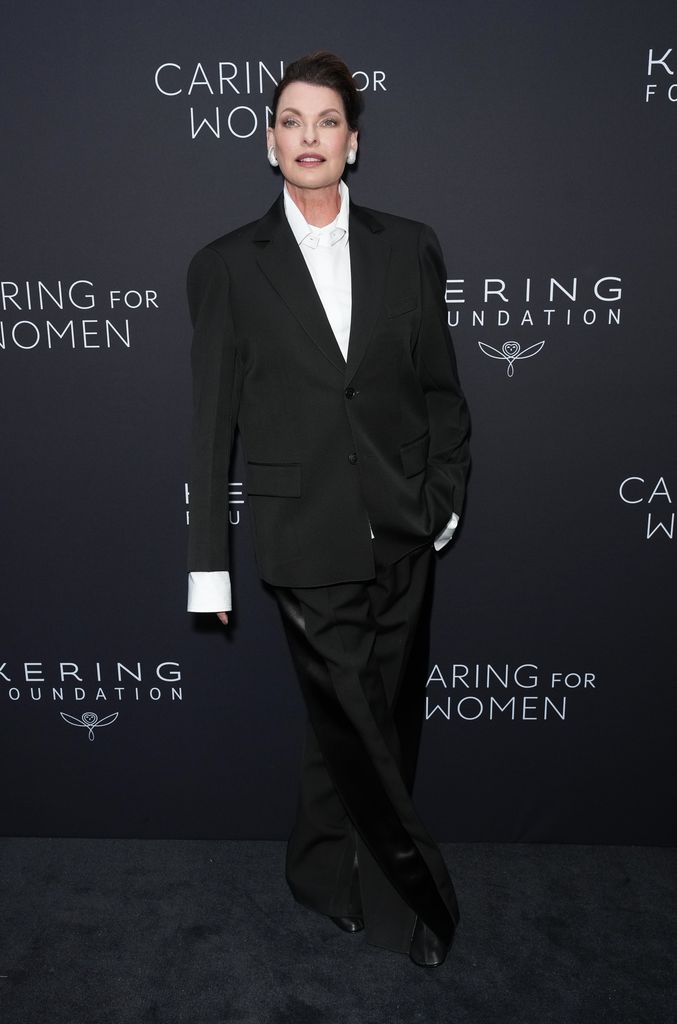 Linda Evangelista attends the Kering Foundation Fourth Annual 'Caring for Women' Dinner in New York  in tuxedo