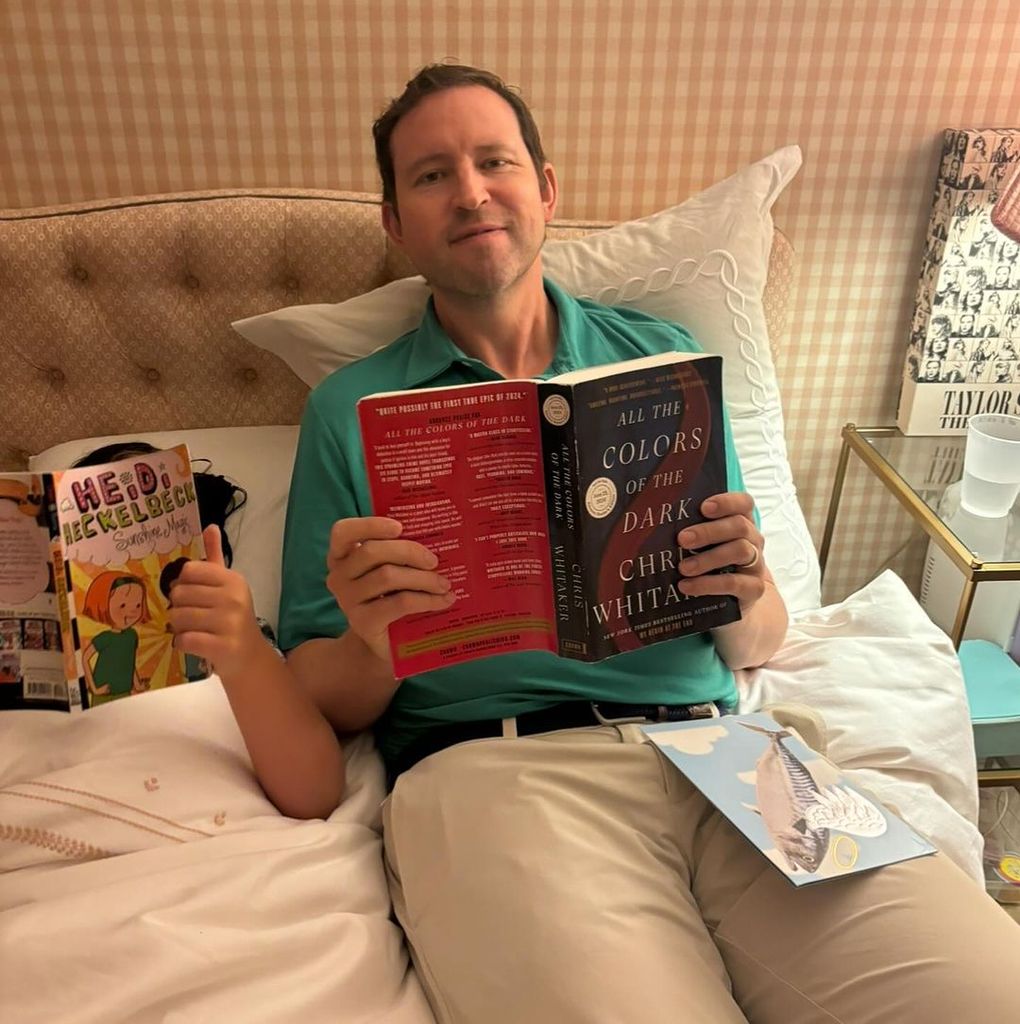 Poppy and her father reading