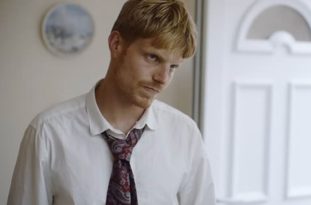 Charley Palmer Rothwell in a still from Looted