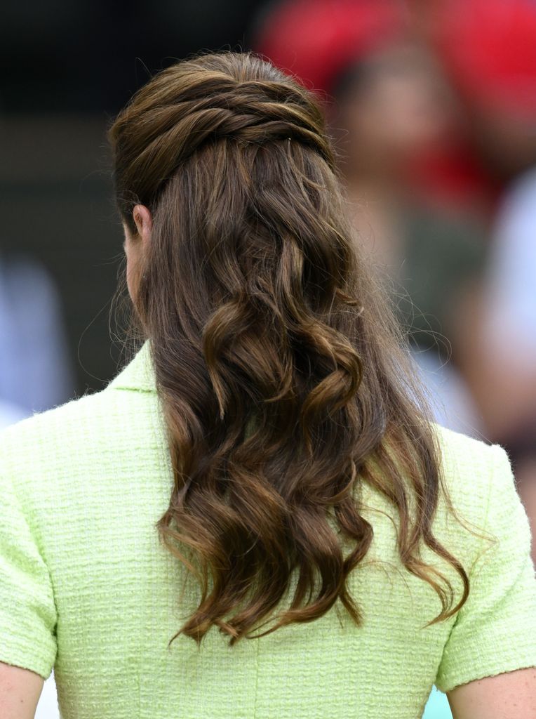 The Princess of Wales' hair is woven into a curled style as she attends day thirteen of the Wimbledon Tennis Championships at All England Lawn Tennis and Croquet Club on July 15, 2023 in London, England.