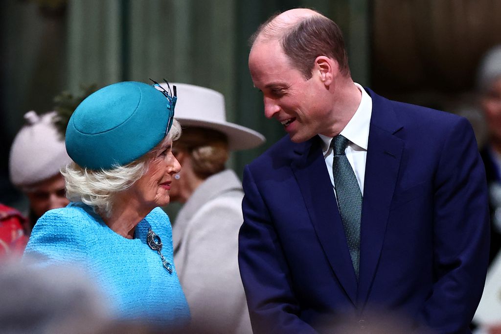 Queen Camilla and Prince William talking