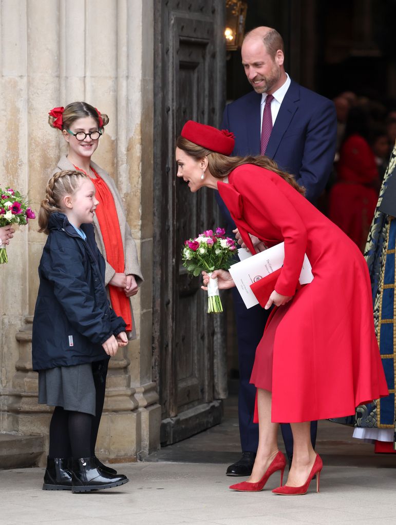 kate receiving bouquet of flowers 