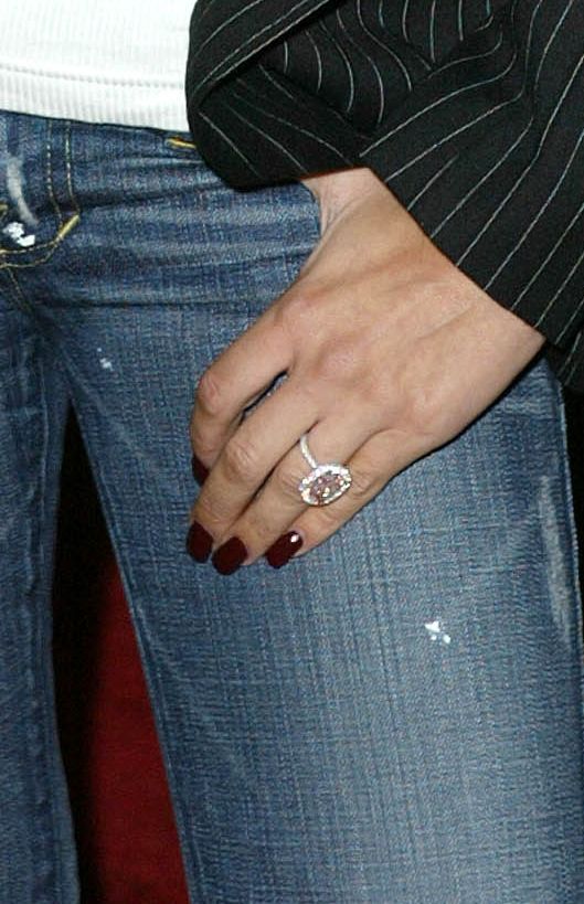 Victoria Beckham in a suit and ring