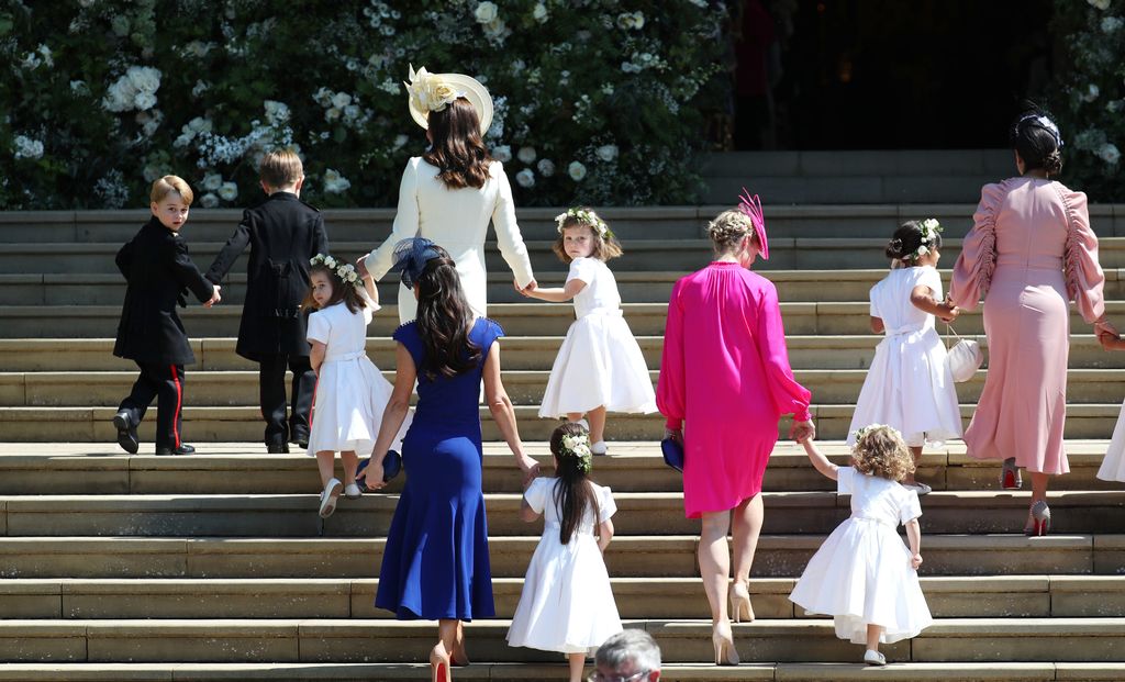 meghan's child pageboys and bridesmaids entering chapel