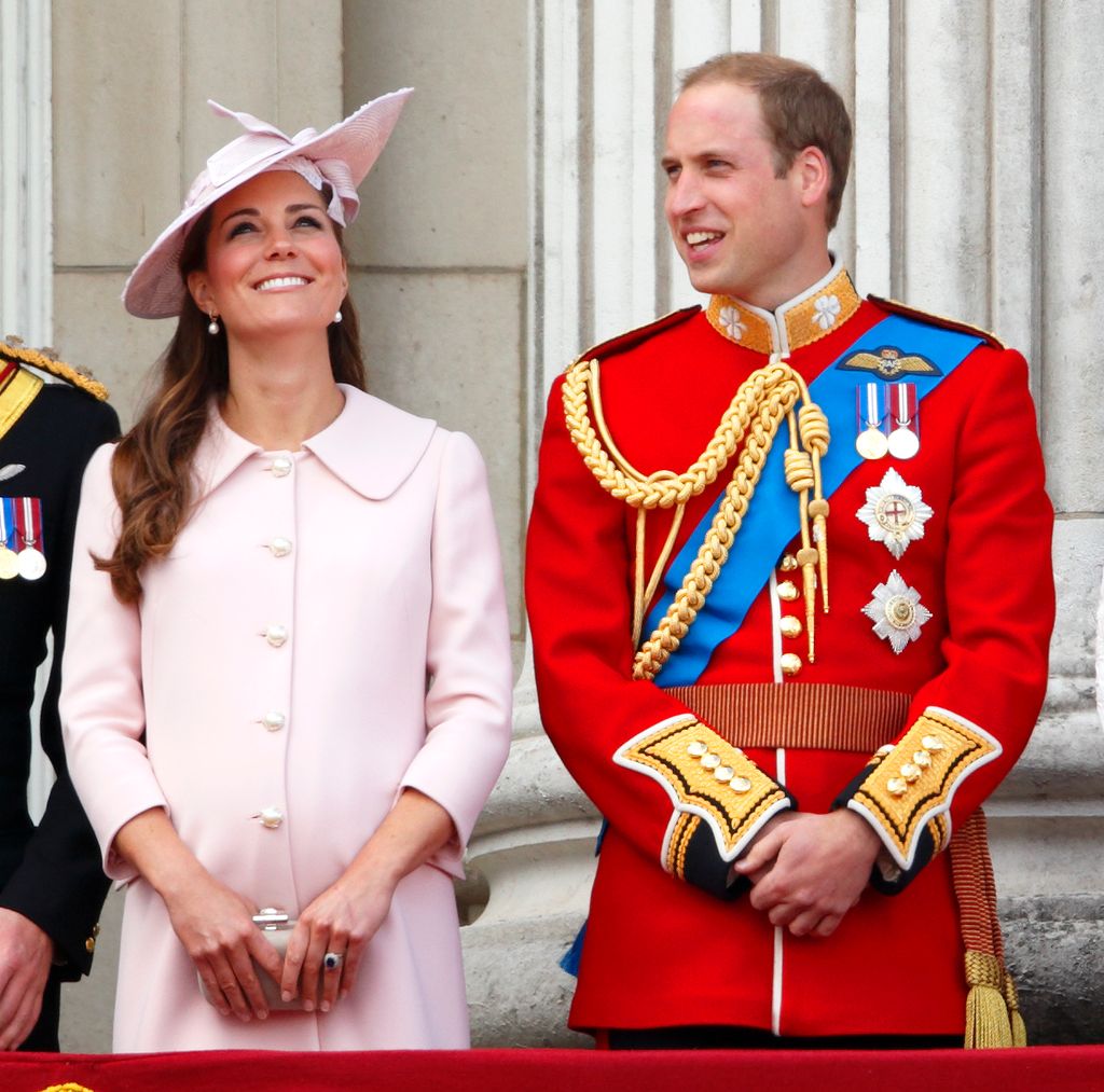 Kate Middleton wearing pink coat while pregnant with Prince George