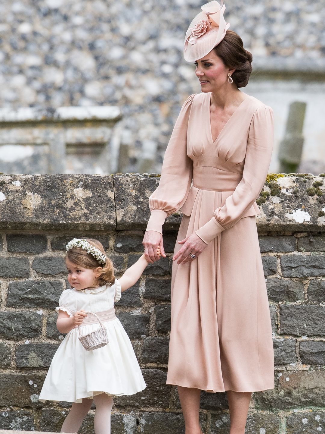 Kate Middleton wearing a pale pink dress 