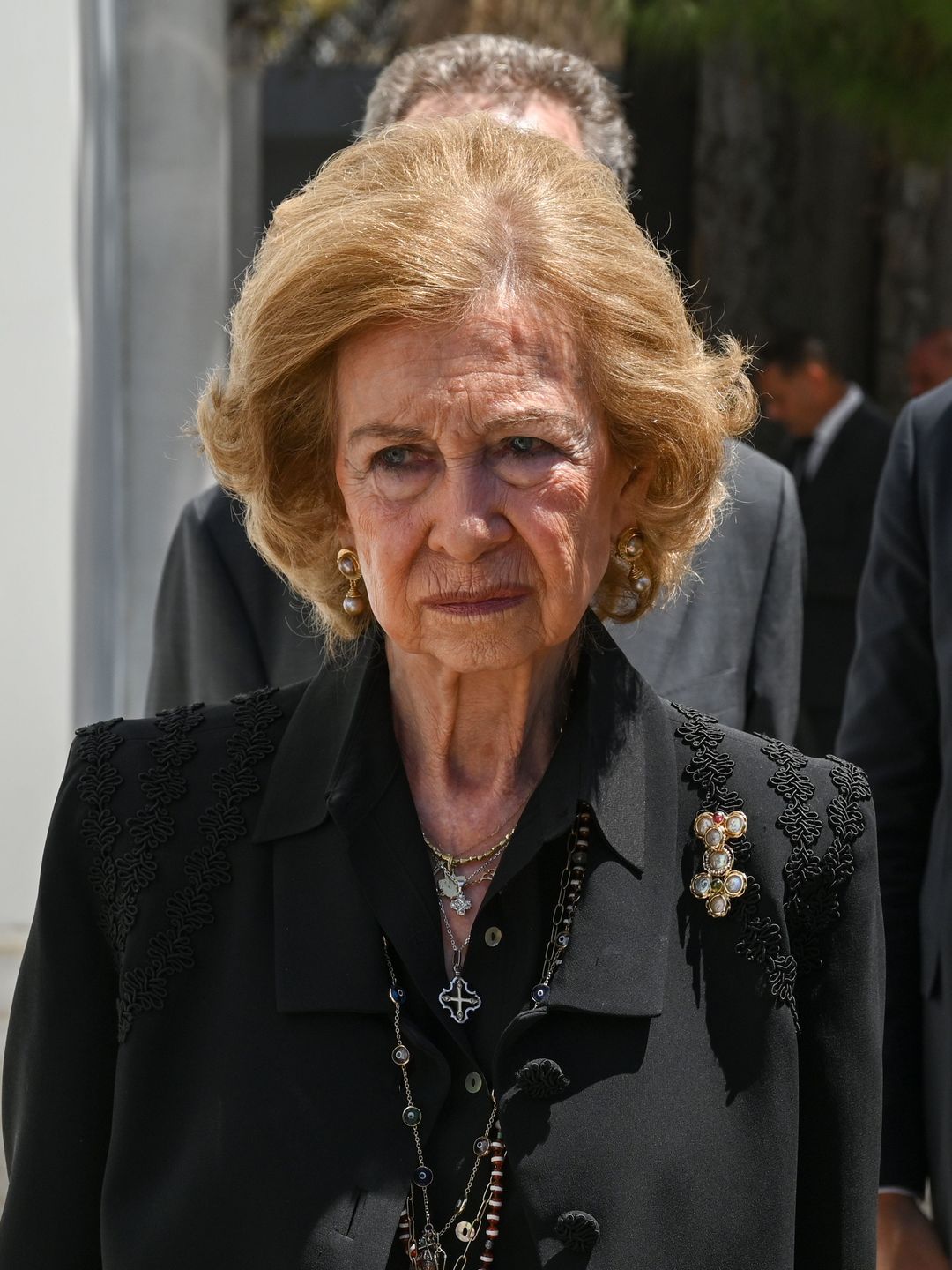 Queen Sonja in a black funeral dress