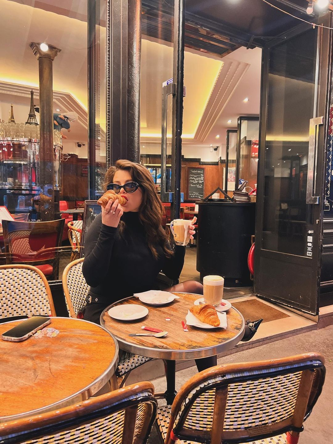Selena Gomez posts an image of her sipping on a coffee and eating a croissant while in Paris 