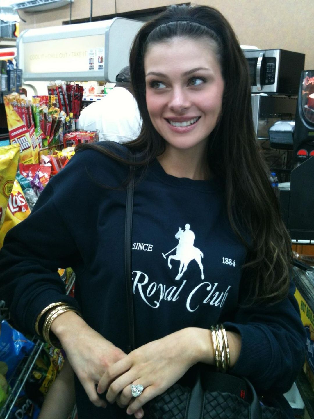 Nicola Peltz wears royal club polo sweatshirt