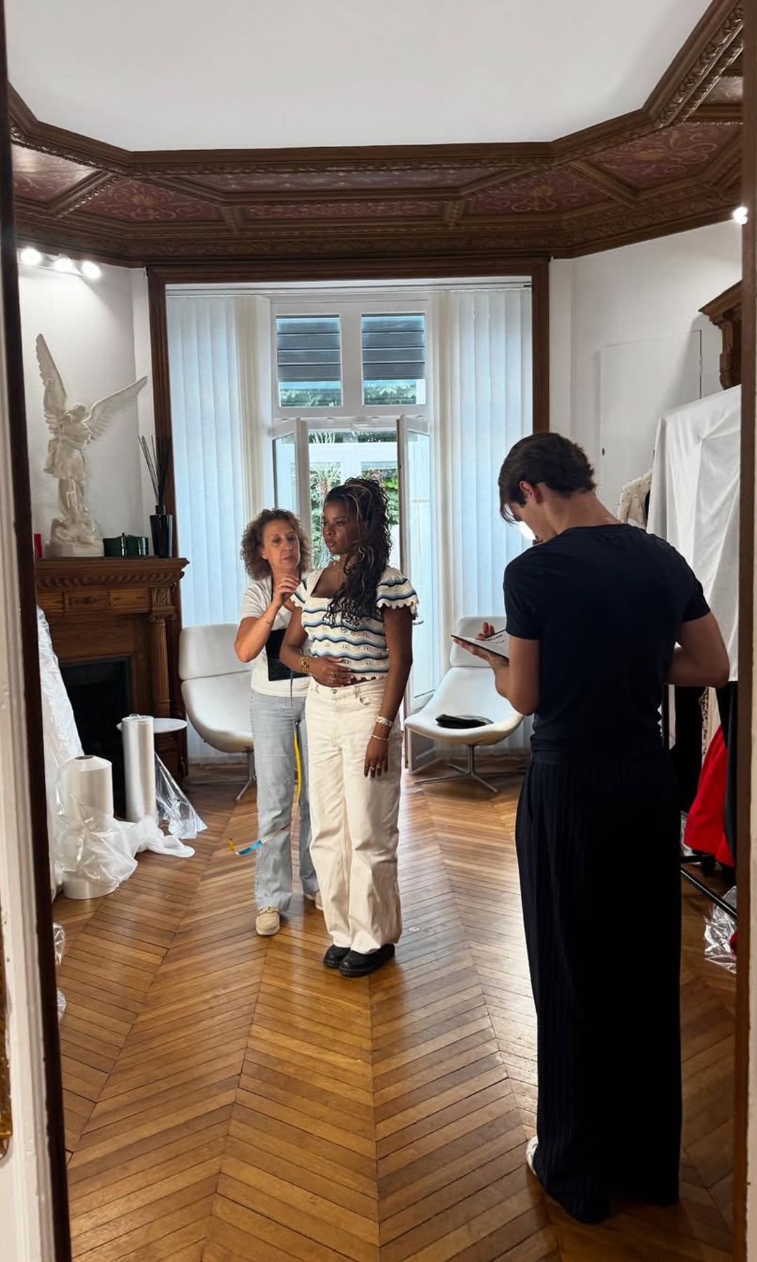 Bronwyn Vance gets her measurements taken at Stephane Rolland's atelier