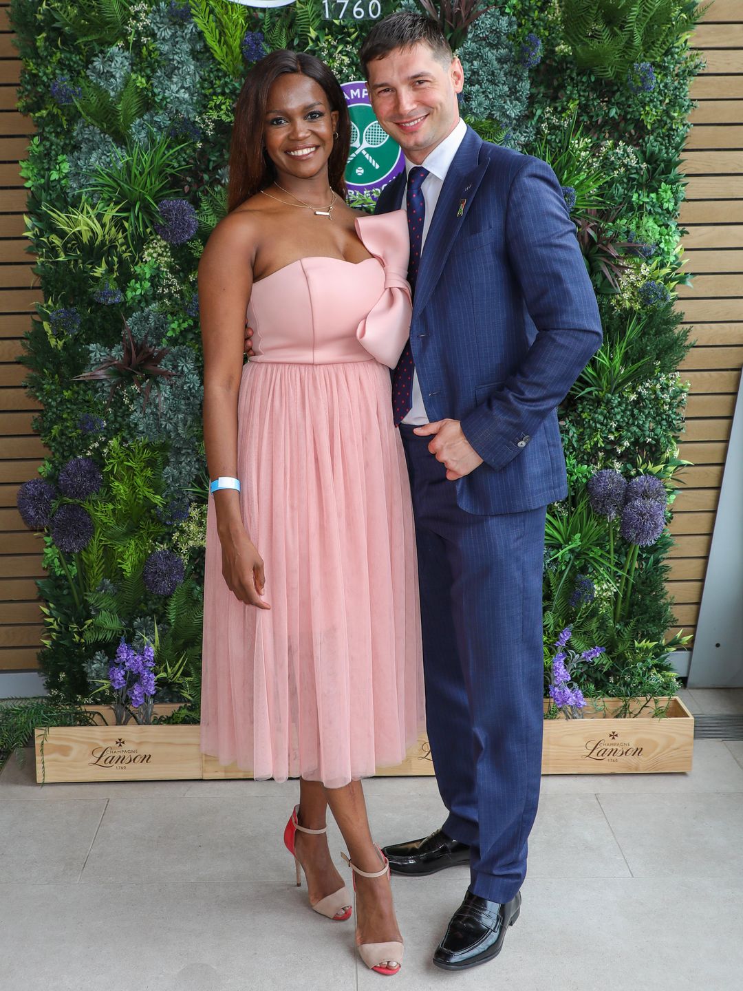 Oti Mabuse and Marius Lepure pictured at Wimbledon in 2021