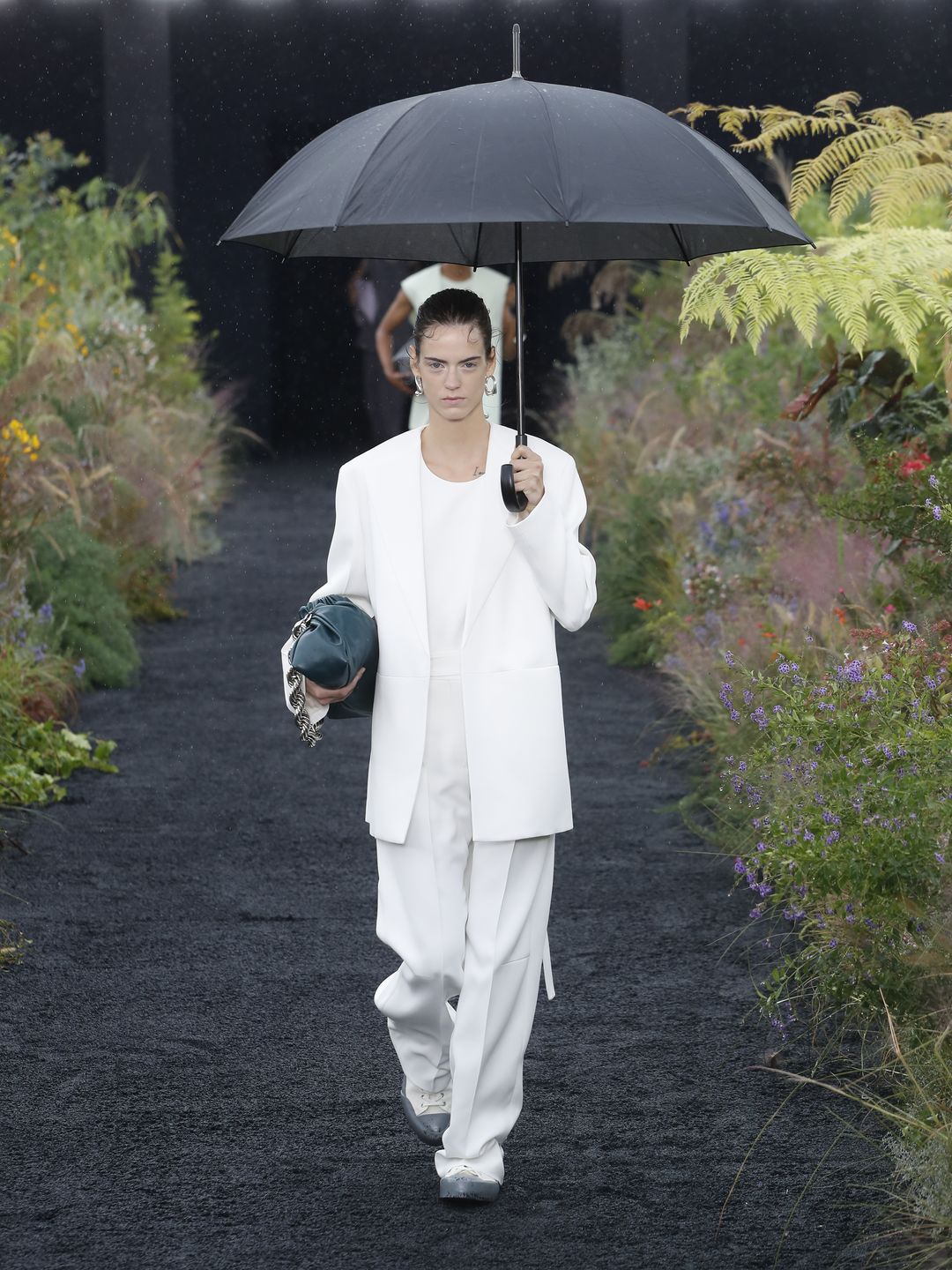 The rain didn't stop the Jil Sander SS23 show