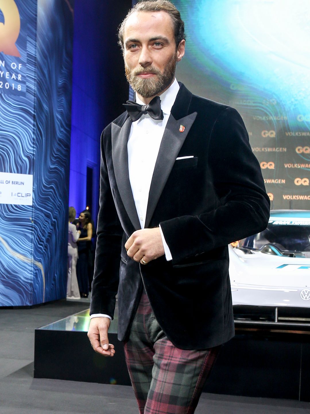 James Middleton in a velvet jacket and tartan trousers