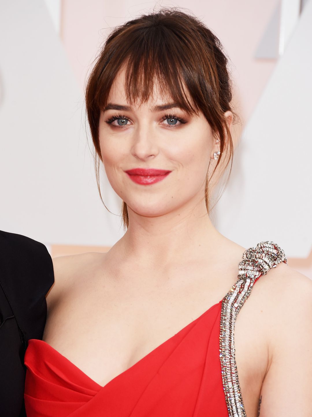 HOLLYWOOD, CA - FEBRUARY 22:  Actress Dakota Johnson attends the 87th Annual Academy Awards at Hollywood & Highland Center on February 22, 2015 in Hollywood, California.  (Photo by Jason Merritt/Getty Images)