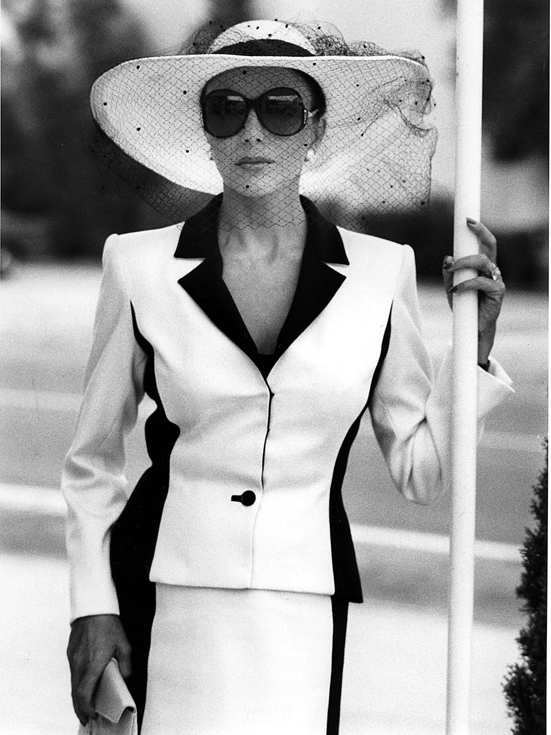Actress Joan Collins wearing a monochrome Nolan Miller suit as Alexis on the set of Dynasty in 1981