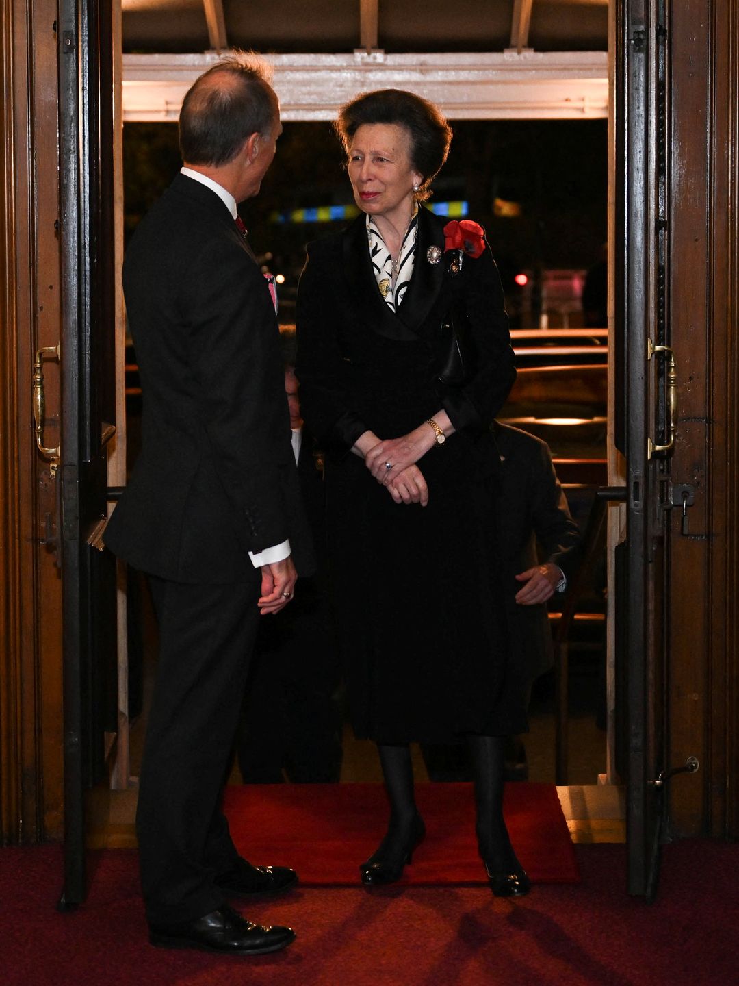 Princess Anne in a black dress at the Festival of Remembrance