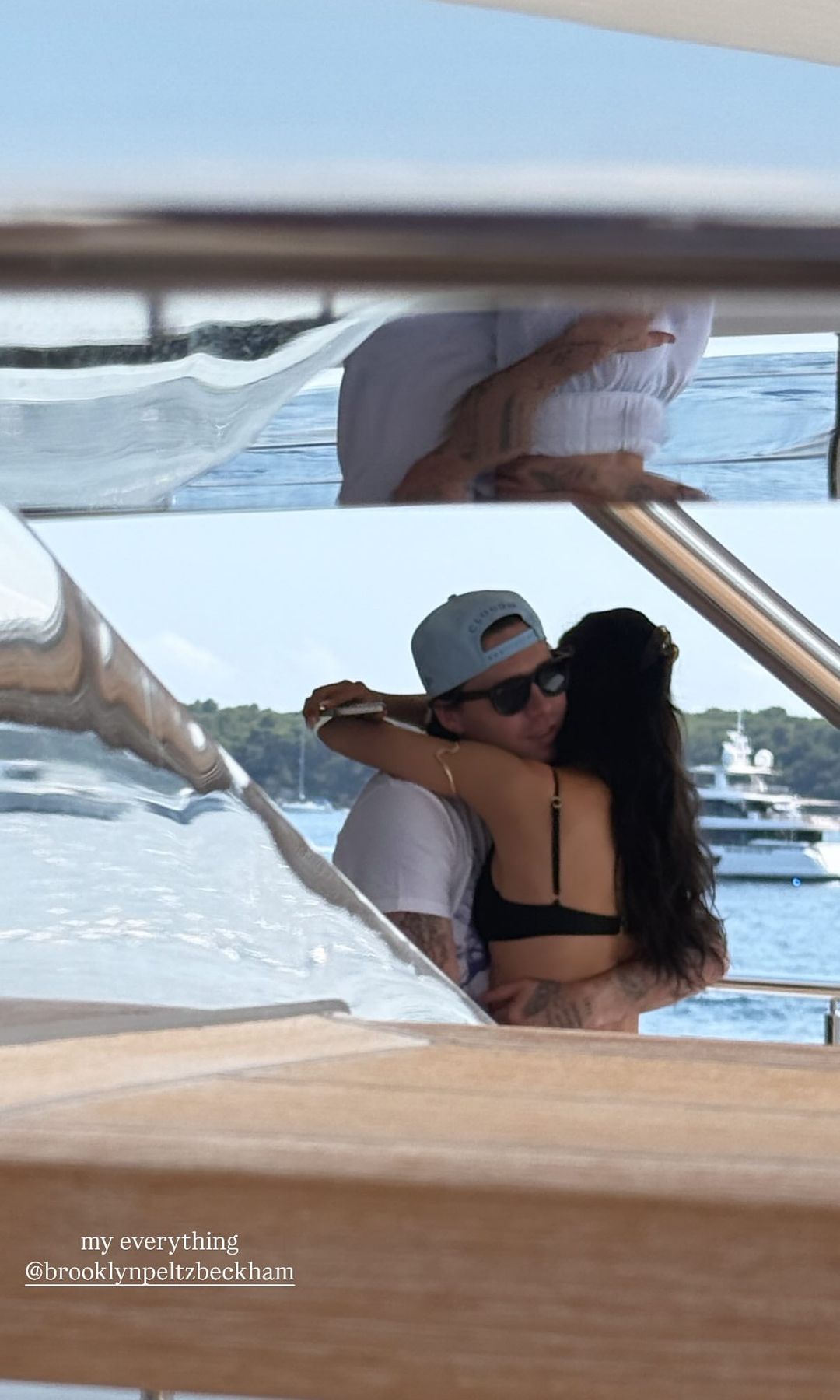 Nicola and Brooklyn Peltz Beckham share a hug on a boat