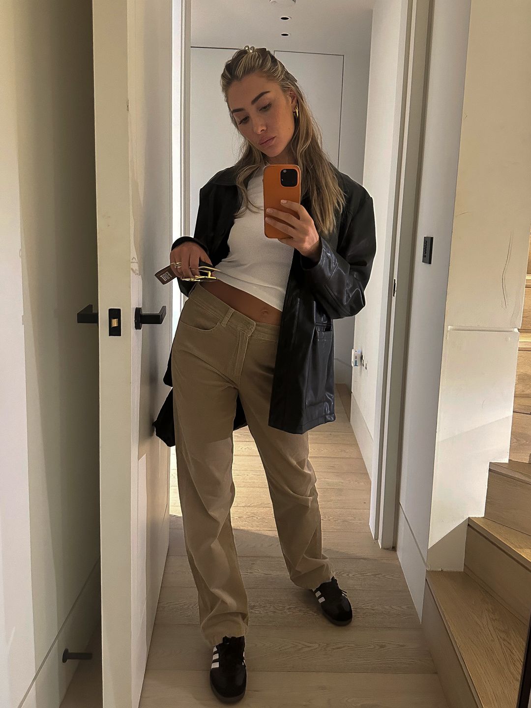 a pair of cream cord trousers from Massimo Dutti, a leather blazer from Topshop, a white tee from Zara, black Adidas Sambas and my Chanel bag.