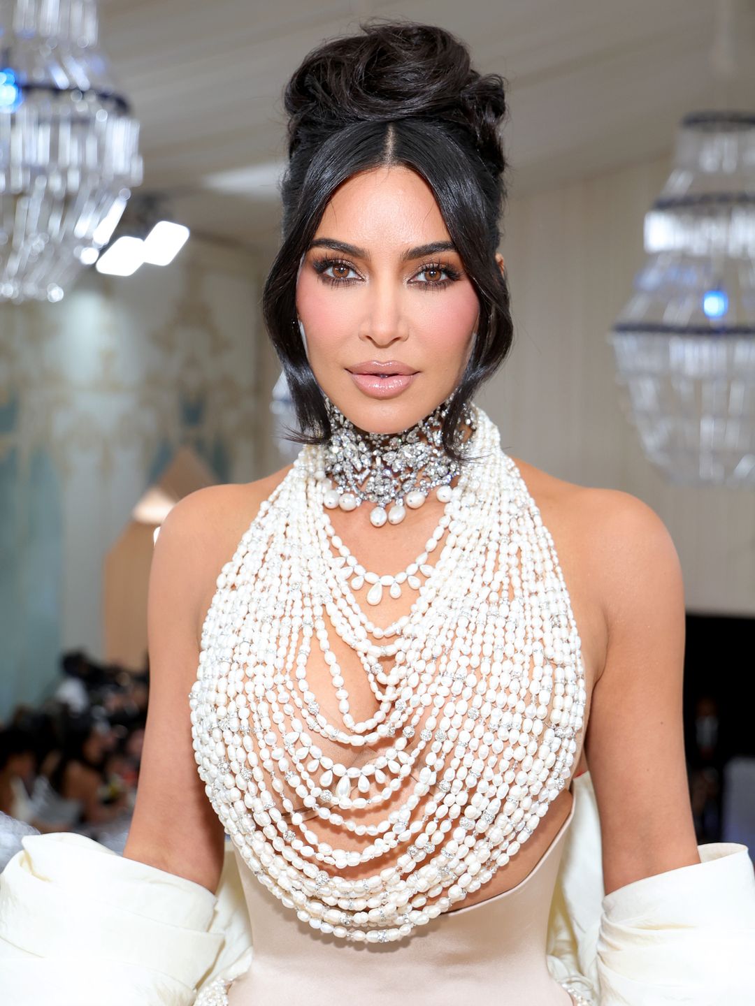 Kim opted for draped pearls by Schiaparelli 