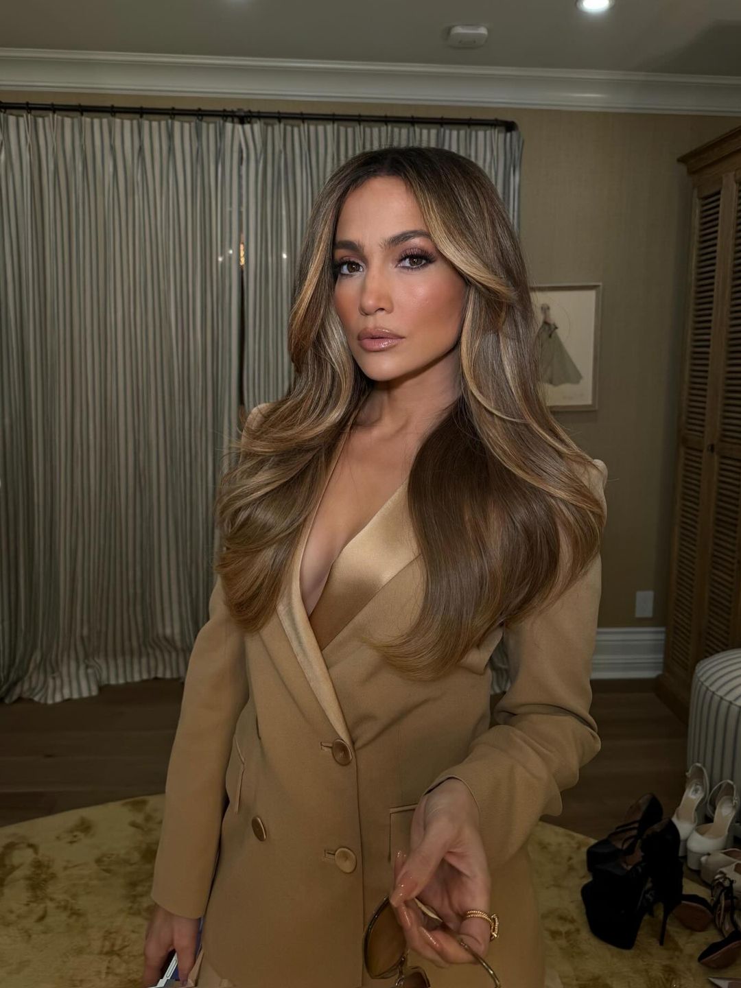 Jennifer Lopez shares an image on her instagram of her hair in a dreamy blowout style