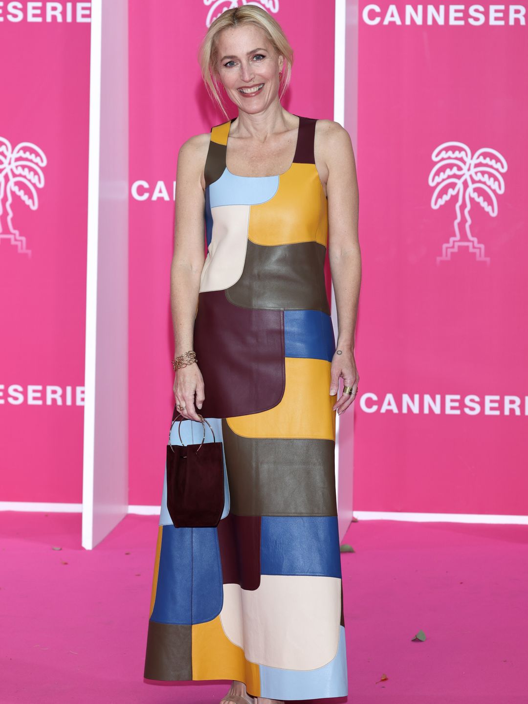 Gillian Anderson attends the pink carpet during the 5th Canneseries Festival