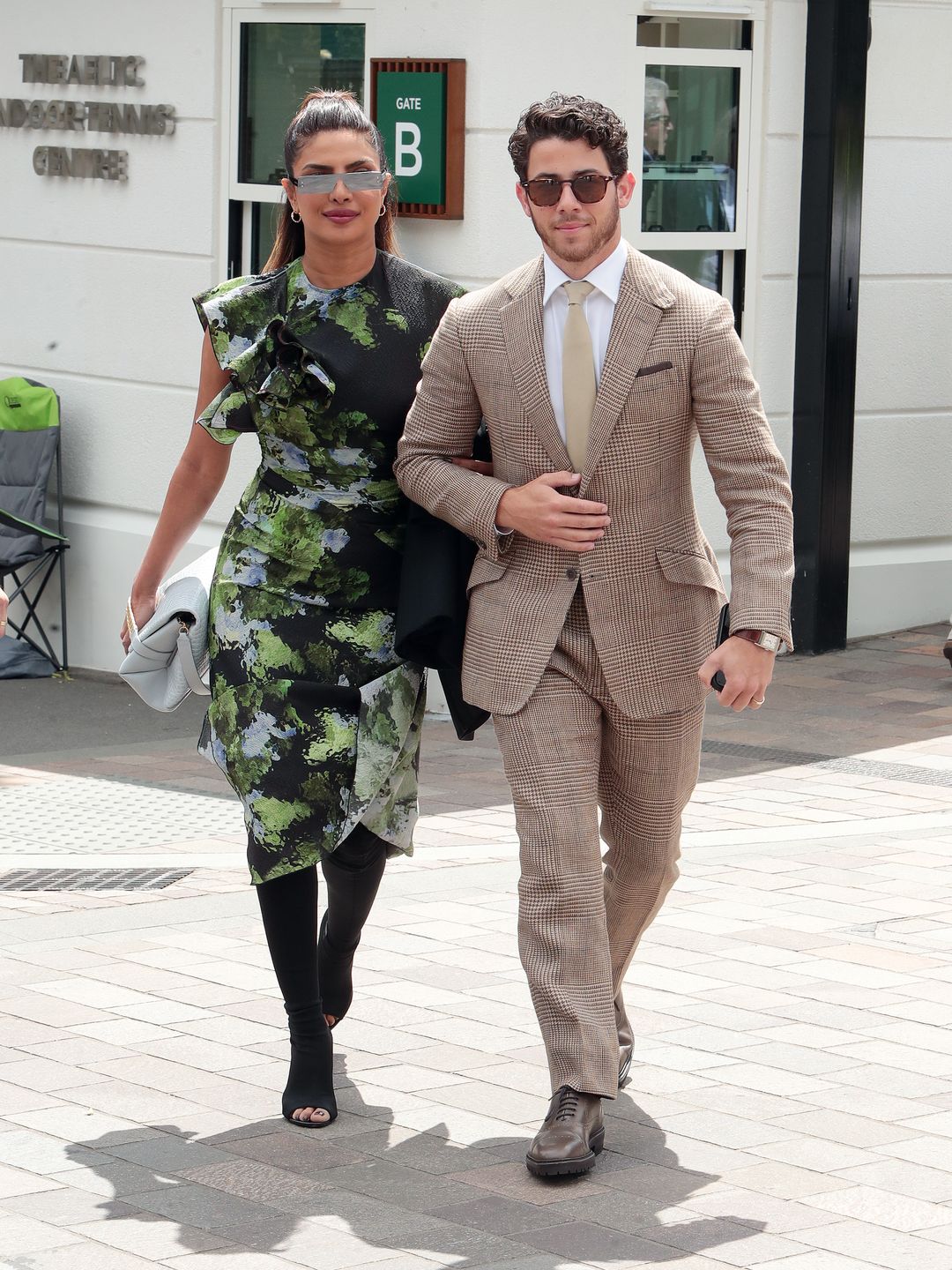 LONDON, ENGLAND - JULY 15: Priyanka Chopra Jonas and Nick Jonas attend day thirteen of the Wimbledon Tennis Championships at All England Lawn Tennis and Croquet Club on July 15, 2023 in London, England. (Photo by Neil Mockford/GC Images)