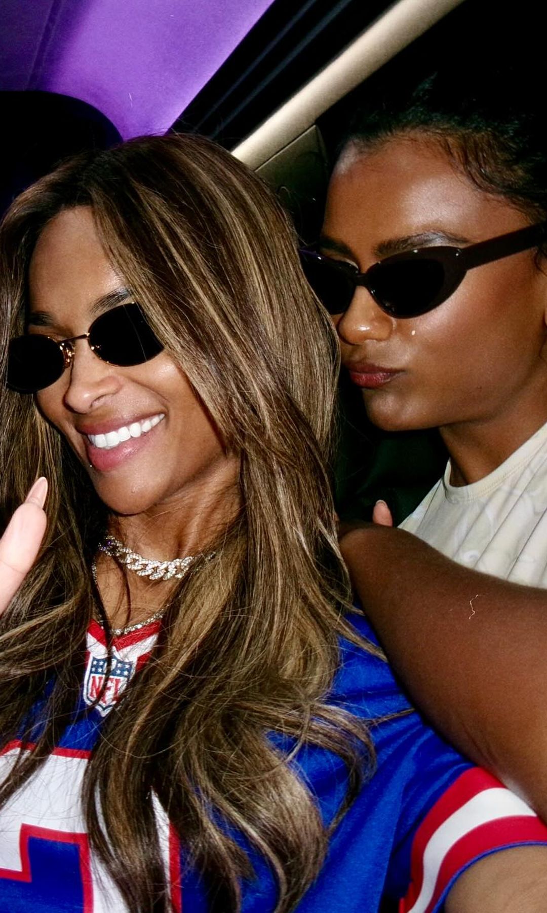 Simone Ashley and Ciara take a selfie in the back of a car