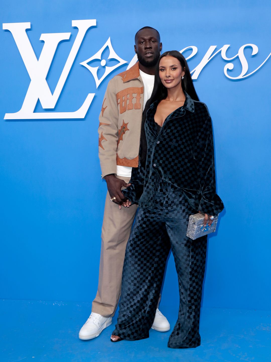 Stormzy and Maya Jama attend the Louis Vuitton Menswear Spring/Summer 2025 show as part of Paris Fashion Week on June 18