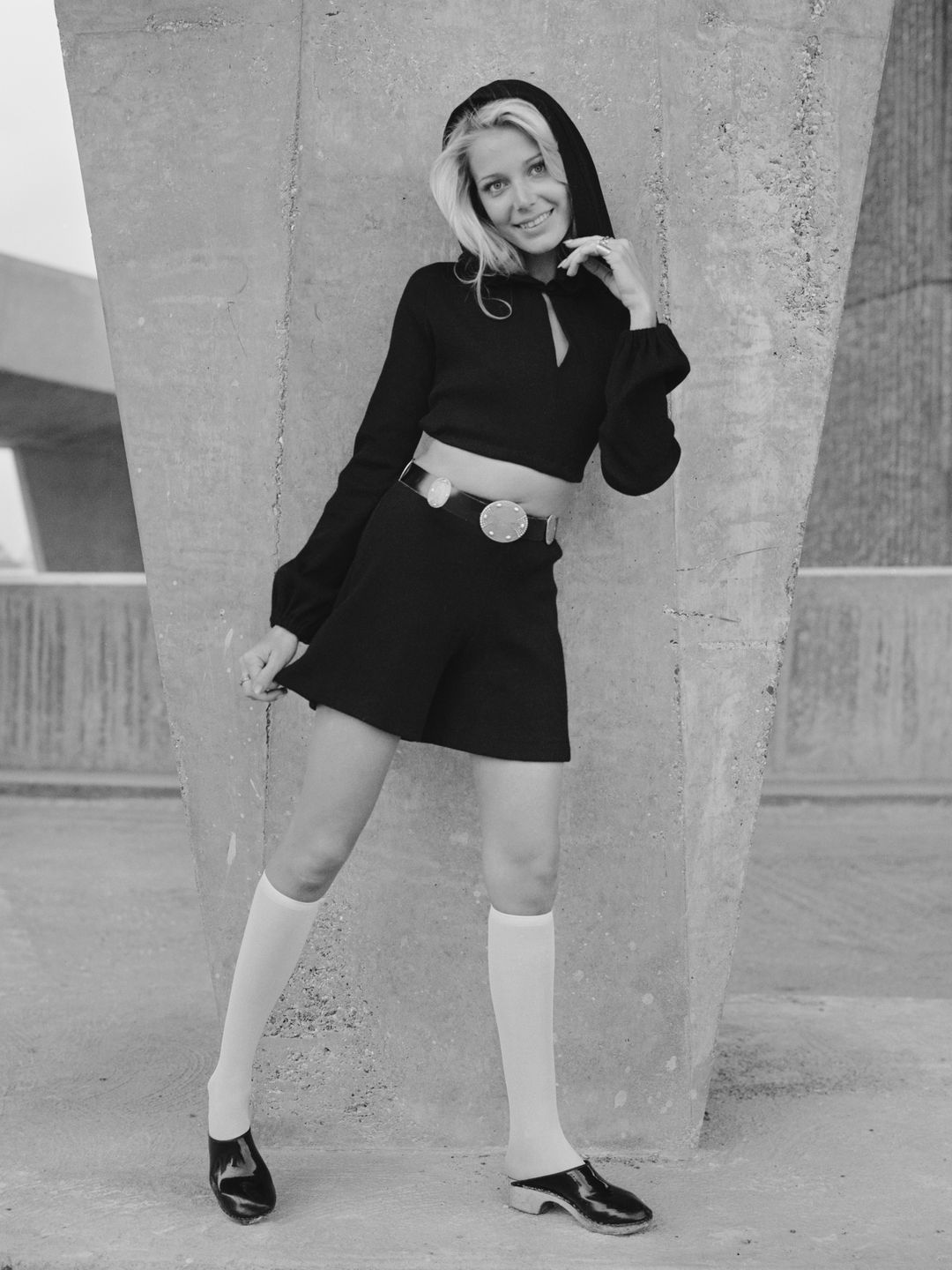 A 1970s model wearing clogs 