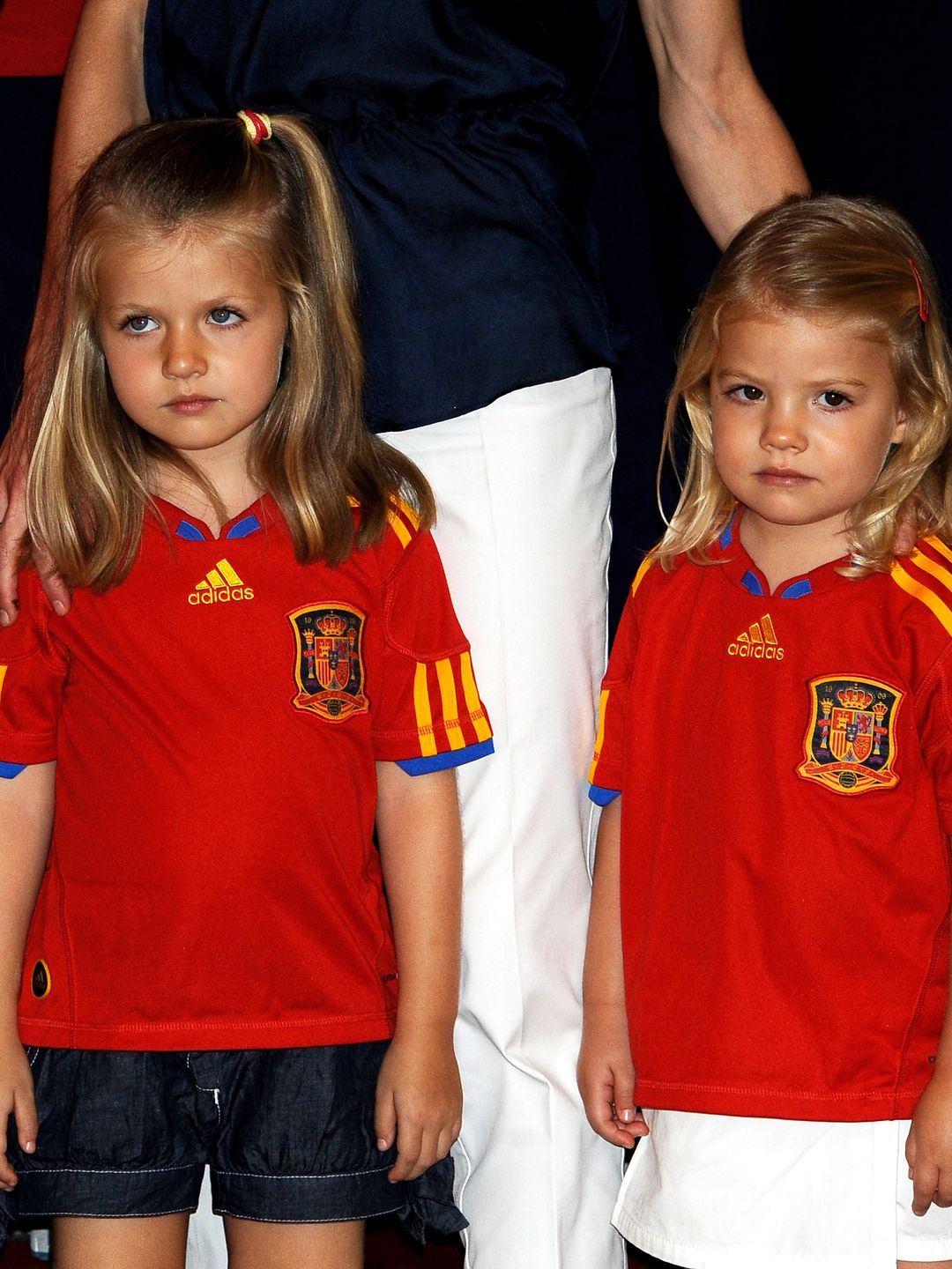 A young Princess Leonor and Infanta Sofia in Spanish football kits