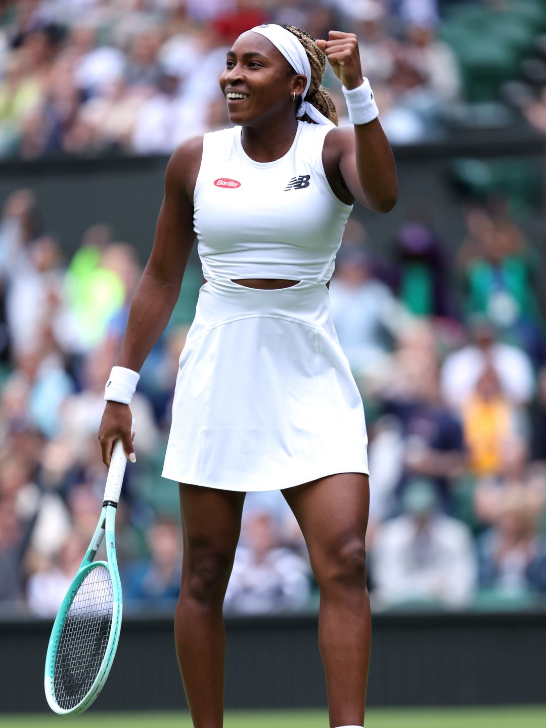 Coco Gauff of United States celebrates against Caroline Dolehide of United States during her Ladies' Singles first round match on day one of The Championships Wimbledon 2024
