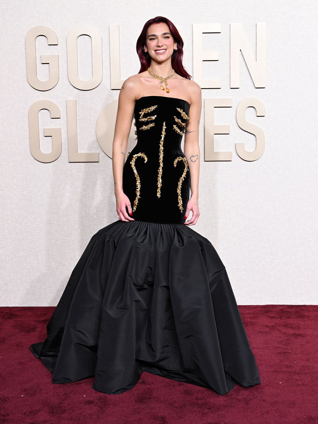 Dua Lipa at the 81st Golden Globe Awards held at the Beverly Hilton Hotel on January 7, 2024 in Beverly Hills, California. (Photo by Gilbert Flores/Golden Globes 2024/Golden Globes 2024 via Getty Images)dua lipa in ballgown 