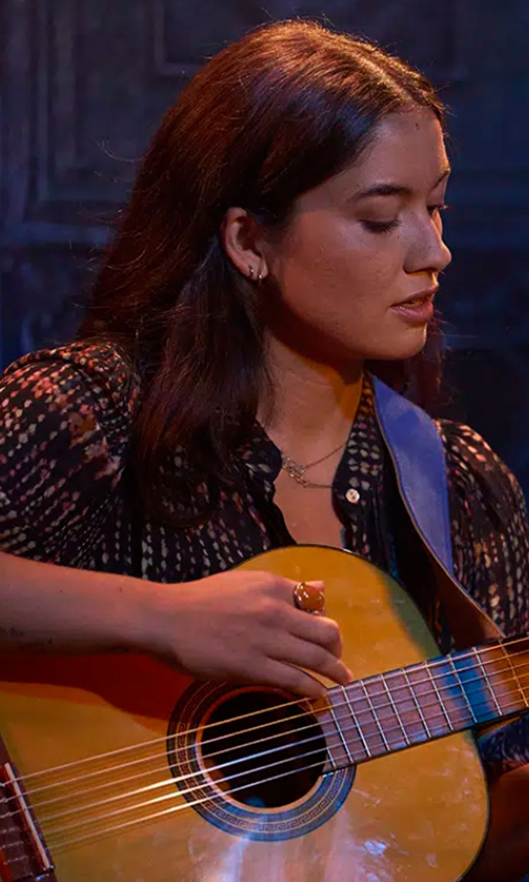 Sydney Agudong playing a guitar in Ripple