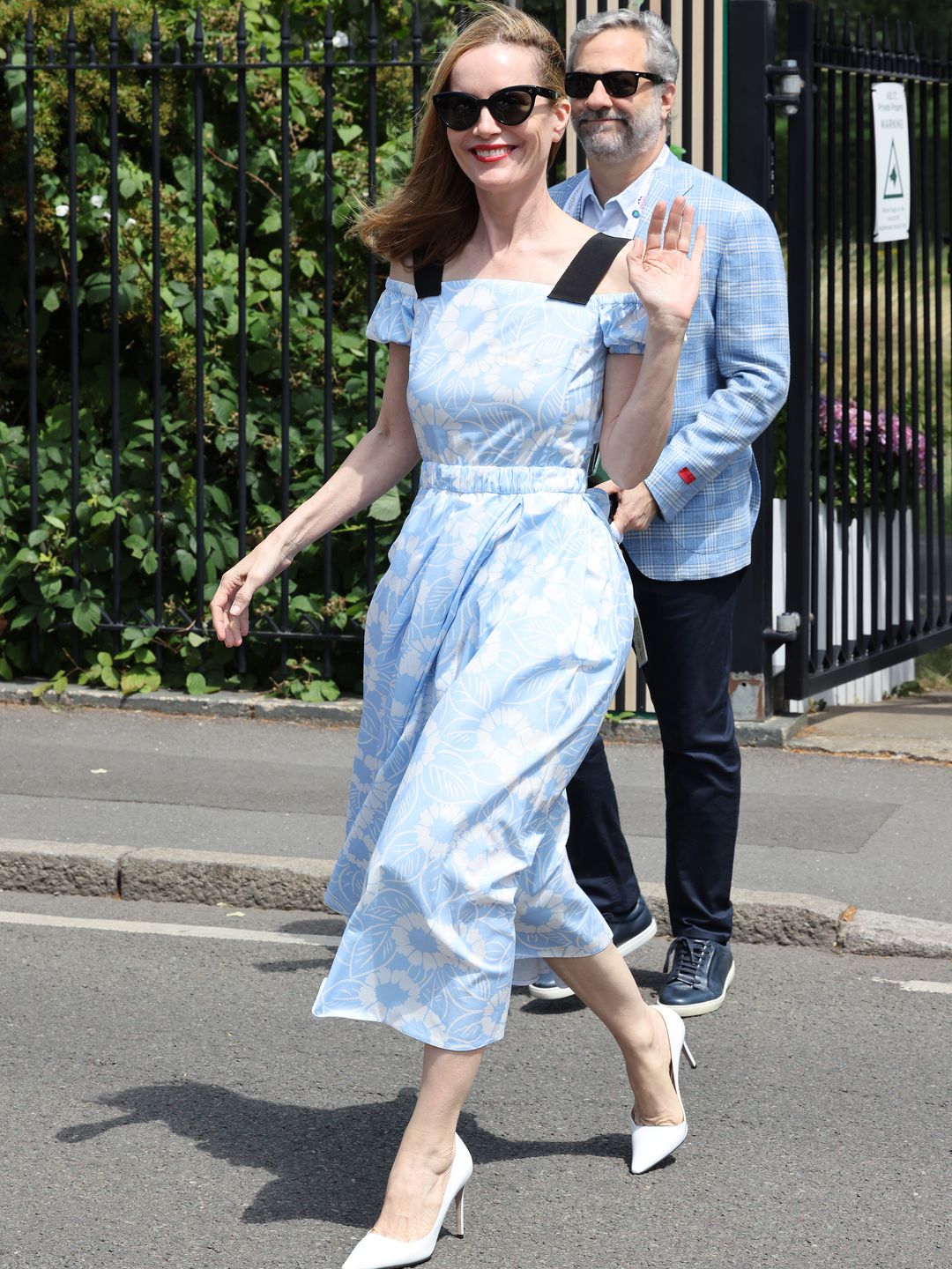 Leslie Mann wears a blue floral print poplin dress from Prada to Wimbledon